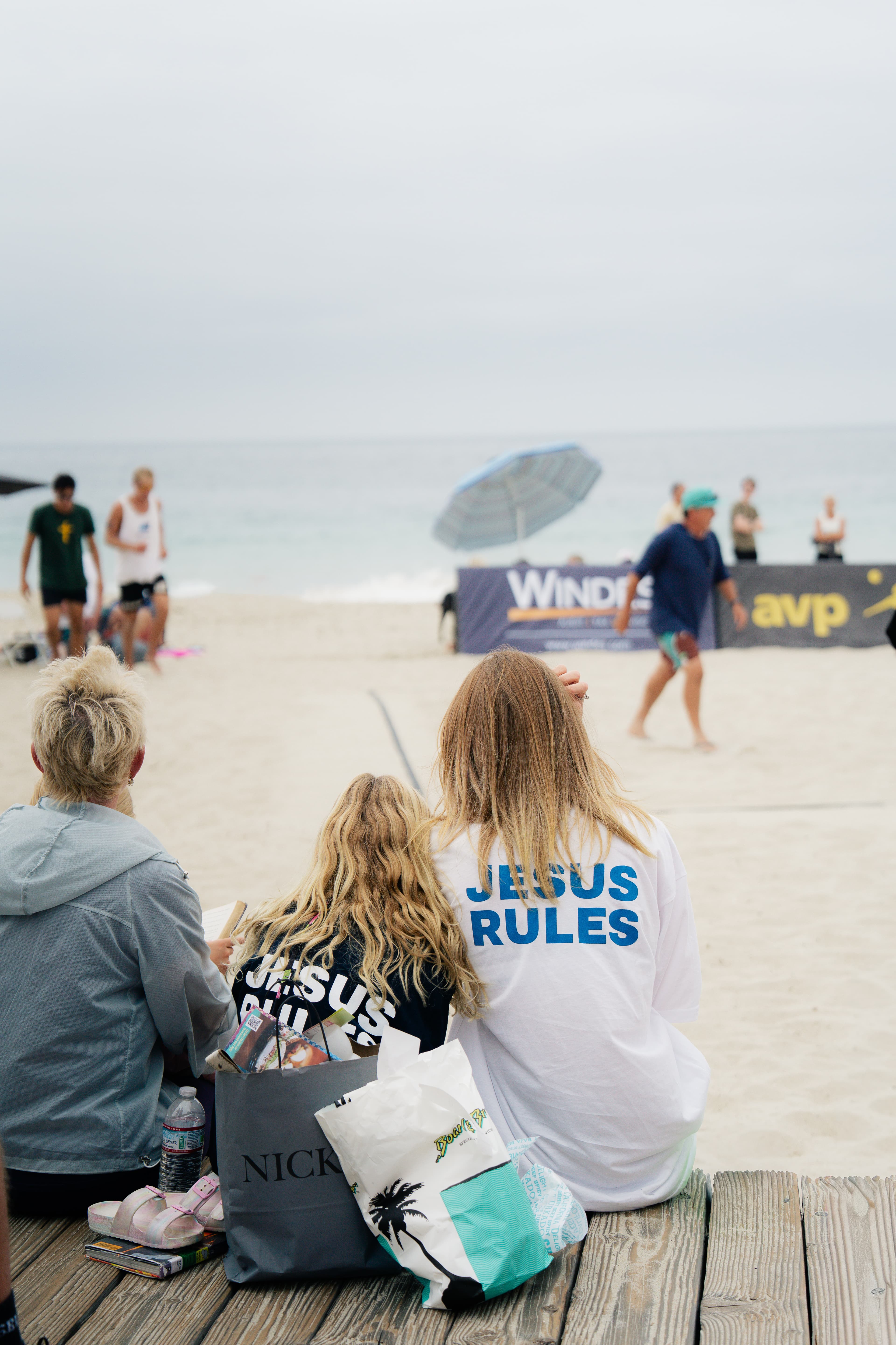 Fans wearing Jesus Rules merch at AVP tournament